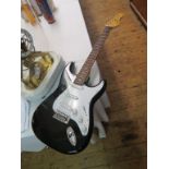 A Falcon electric guitar, and a banjo, latter corroded, each in case