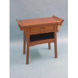 A Chinese teak side table, with single drawer and recess beneath, 2ft. 5in.
