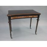 A Victorian ebonised mahogany card table, later-applied with early 18th century crewel-work to
