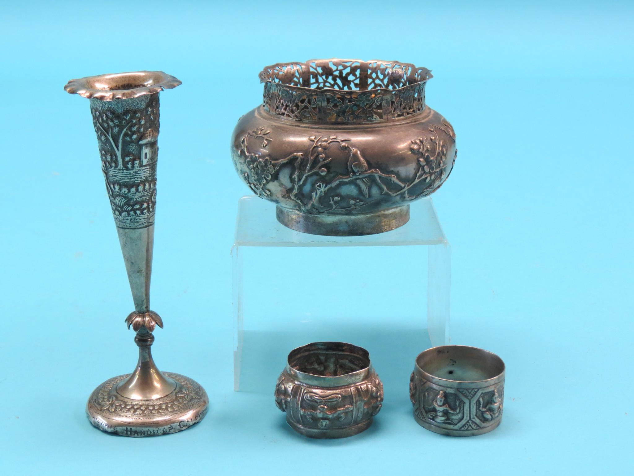 A Chinese silver bowl, cast with birds and foliage, 4.5in. diameter, an Indian silver posy vase