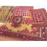 A Koliai Eastern wool rug, bright designs including crimson against a beige field, 7ft. 6in. x