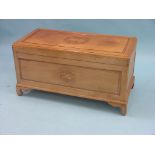 An Eastern hardwood blanket chest, with carved medallions to top and front, 3ft. 1in.