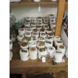 A collection of 47 marmalade jars, each with cover, miscellaneous colour-printed designs