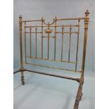 A Victorian brass bedstead, with ornamental tubular head and footboards, to fit 4ft. 6in.