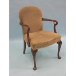 A George II-style mahogany elbow chair, upholstered in a green dralon, on front cabriole legs,