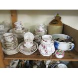 A Royal Albert bone china dinner and tea service, Lavender Rose, 64 pieces including teapot, also to