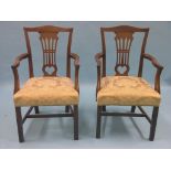 A set of eight Victorian Chippendale mahogany dining chairs, including a pair of armchairs, camel-