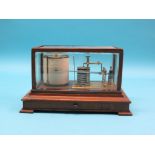 A late Victorian barograph, oak-cased with bevelled glass panes, retailer Callaghan & Co., New