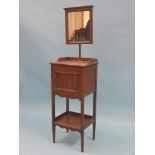 A Victorian walnut wash stand, adjustable shaving mirror above panelled cupboard, open undertier,