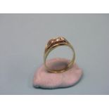 A gentleman's 18ct. gold ring, set three small diamonds, size U