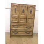 An Armstrong bedroom cupboard, woodgrain-effect with two base drawers, 2ft. 11in., and a period-