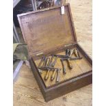Nine various dining table winding cranks, contained within large Victorian brass-mounted box, also