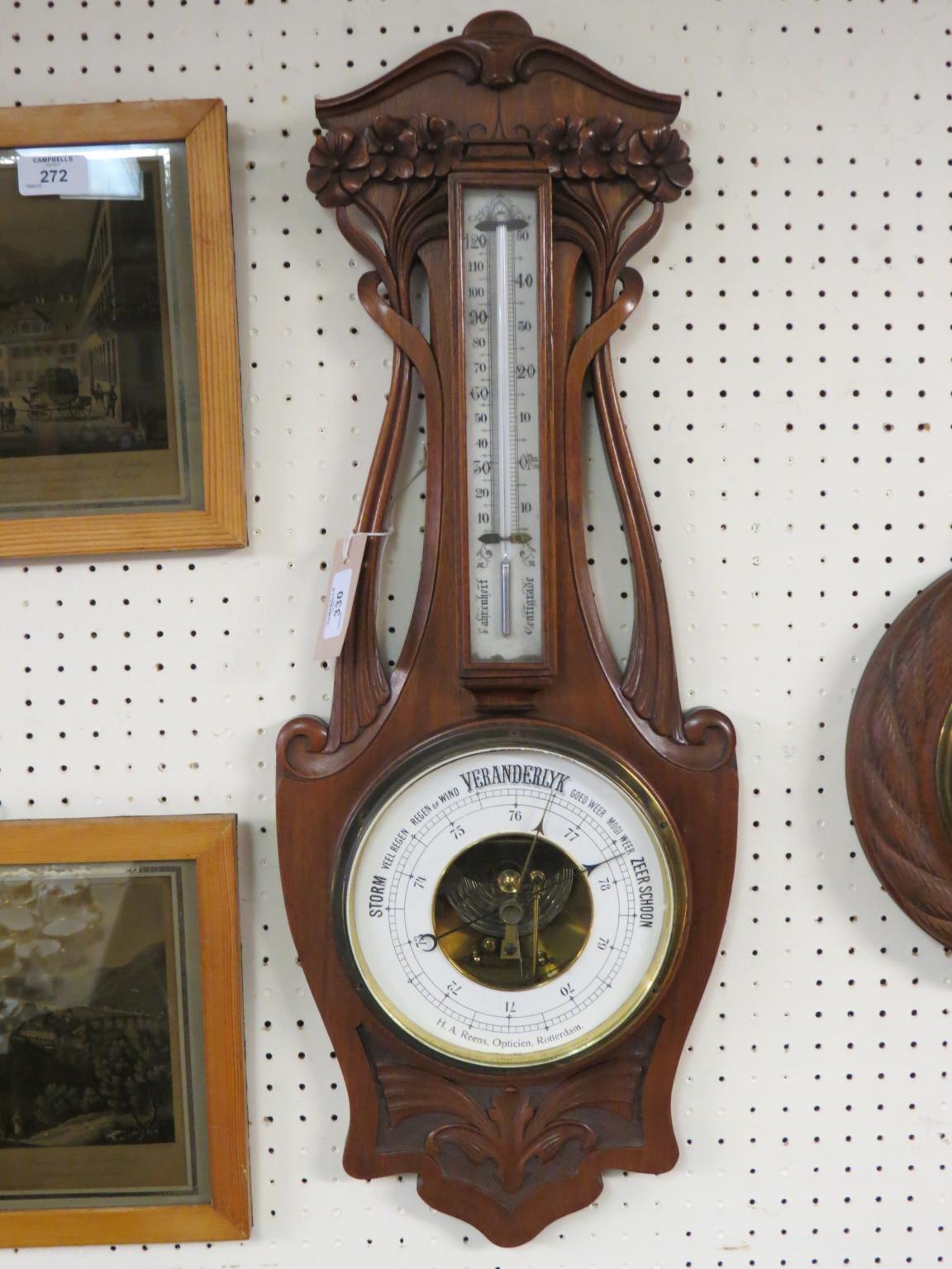 A Dutch late 19th century walnut wheel barometer, aneroid dial signed Reens, Rotterdam, case