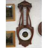 A Dutch late 19th century walnut wheel barometer, aneroid dial signed Reens, Rotterdam, case