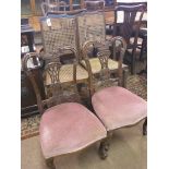 A pair of Victorian carved mahogany nursing chairs, with upholstered seats, together with a pair