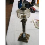 A Victorian brass oil lamp, Corinthian column on square, stepped base, 18in. - converted to