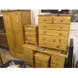 A modern waxed pine bedroom suite, wardrobe, 3ft., dressing table with eight drawers, 4ft. 5in.,