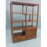 An Eastern export display cabinet, five open shelves, panelled cupboard and single drawer, 3ft.