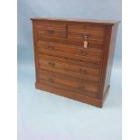A late Victorian solid walnut chest, two short and three long drawers, engraved brass handles,