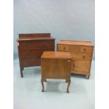 A dark oak bedroom chest, three drawers, 2ft. 9in., a medium oak chest, two drawers above