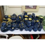 A large quantity of Denby stoneware, tableware consisting of jugs, covered dishes, teaware and