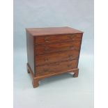 A George III mahogany chest, four graduated drawers with oak-linings, on bracket feet, 2ft. 7in. -