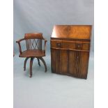 An Edwardian mahogany revolving office armchair, with inlaid satinwood, on square tapering legs with