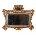 Specchiera in legno intagliato e dorato, XIX secolo, - decori a volute e fogliacei, [...]
