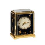 JAEGER-LECOULTRE , ATMOS-BLACK MARINA, "FISHES". Fine, rectangular gilt brass and [...]