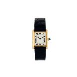 CARTIER, Paris, 18K yellow gold wristwatch with a gold cartier deployant clasp. Made [...]