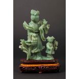 A jadeite "Guanyin and child" group, China, early 20th century - Jen Renée [...]