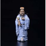 A glazed pottery figure of dignitary with ruyi, China, early 20th century - h cm 33 - [...]