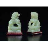 Two green jade figures of Pho dogs, China, 20th century - h cm 16,5 - Start price : [...]