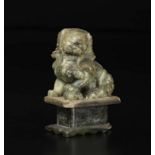 A green and russet jade figure of Pho dog, China, 20th century - cm 8x12x18 - Start [...]