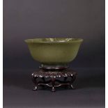 A green jade bowl, China, Qing Dynasty, 19th century - Jen Renée collection - Milan [...]