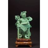 A small turquoise figure of Guanyin, China, Qing Dynasty, late 19th century - Jen [...]