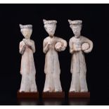 Three painted pottery figures of musicians, China, Tang Dynasty (618-906) - h max cm [...]