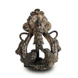 A knocker in molten bronze, chiselled and gilded. 16th century founder from Veneto, [...]