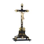 An important crucifixion in ebanised wood, carved ivory, molten, chiselled and gilded [...]