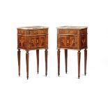 A pair of nightstands with a walnut veneer, threaded and carved in precious woods, [...]