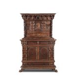 A carved cabinet in walnut and walnut wood with a supporting item, Genoa 17th-18th [...]