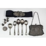 A Victorian silver caddy spoon with shell pattern bowl and spiral twist handle with moulded