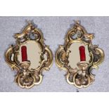 A 19th Century gilt framed rectangular wall mirror, the frame boldly carved with acanthus, 29ins x