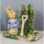 A mid 20th Century automaton model of "Mr Peter Rabbit in Mr McGregor's Garden", 29.5ins high x