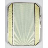 A George V silver cream and yellow guilloche enamel rectangular cigarette case with engine turned