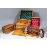 A late Victorian walnut jewellery box, the interior with two cut glass scent bottles, 7ins square