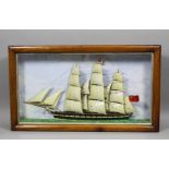 A Victorian painted diorama of a three masted sailing ship in glazed box frame, 23ins x 13.25ins