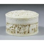 A Chinese "Cantonese" turned and carved ivory circular box and lid, the sides and top deeply