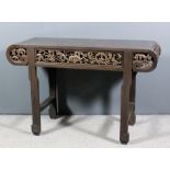 A Chinese stained wood rectangular altar table with flush panel to top and scroll ends, the apron