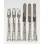 A set of ten Victorian silver fruit knives and forks, the bamboo pattern oval handles and blades